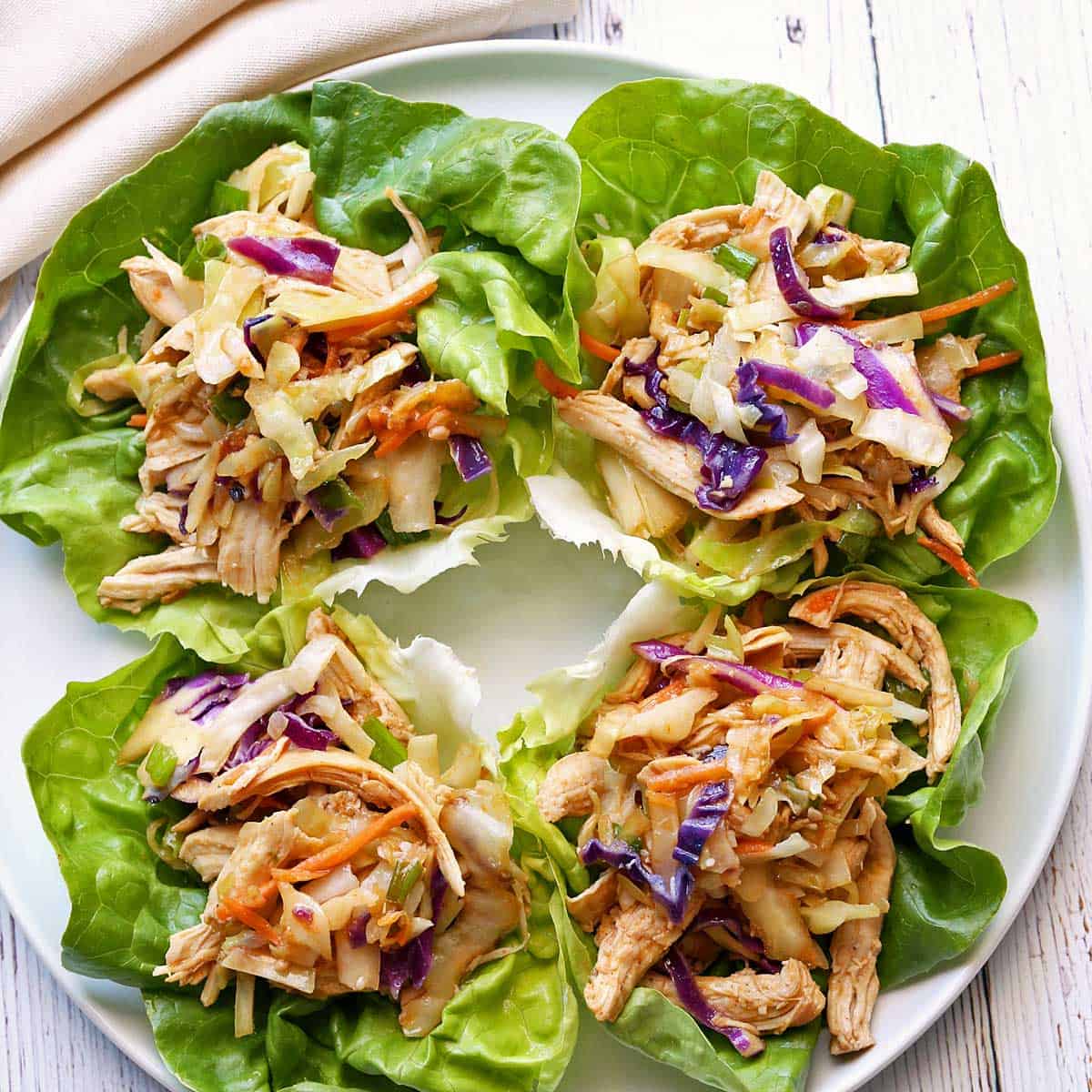 Moo shu chicken is served in lettuce wraps.