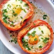 Breakfast tomatoes are served in a white baking dish.