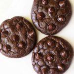 Keto chocolate cookies are served on a white plate.
