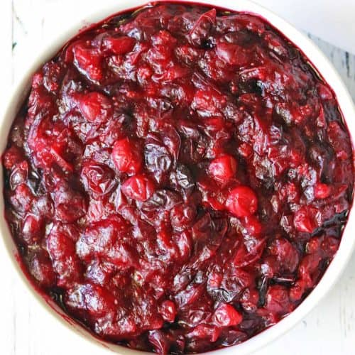 Sugar-free cranberry sauce is served in a white bowl.