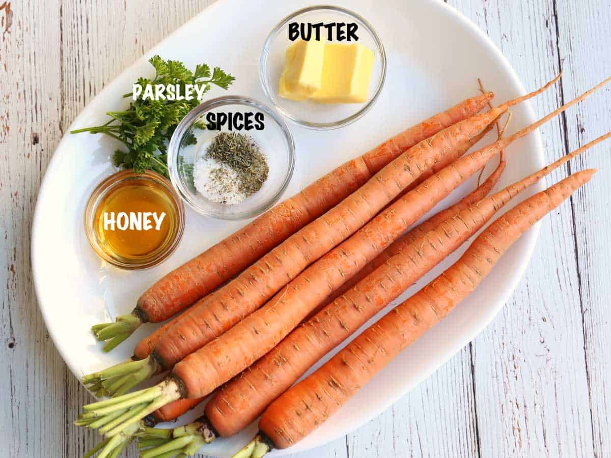 The ingredients needed for making honey-glazed carrots.