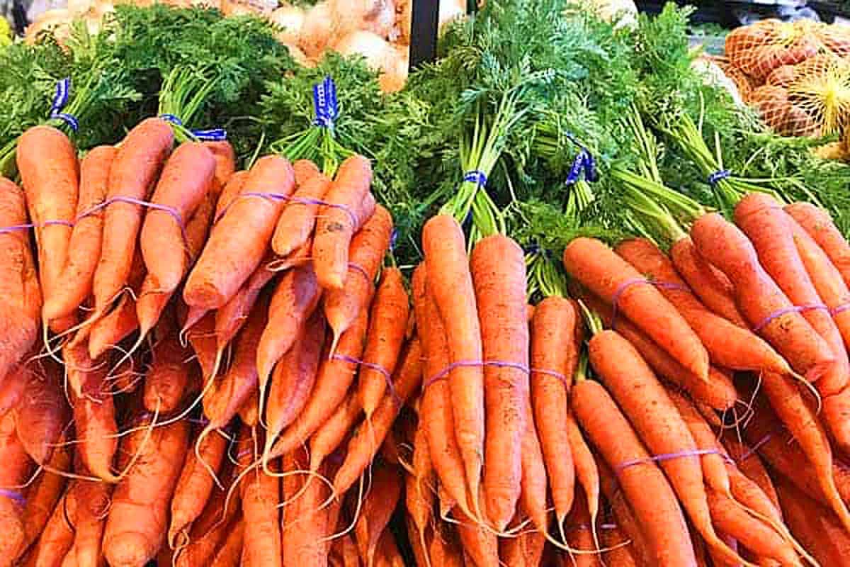Bunches of petite carrot photographed in the market.