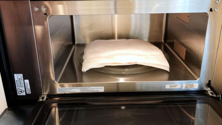 The bacon was placed in the microwave.