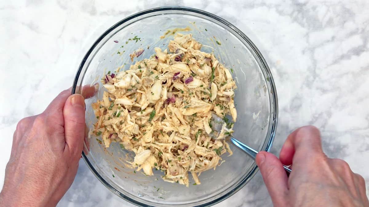 Mix crab salad in a bowl.
