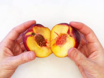 A peach was cut in half.