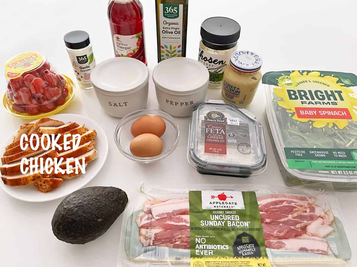 The ingredients needed to make a chicken Cobb salad.
