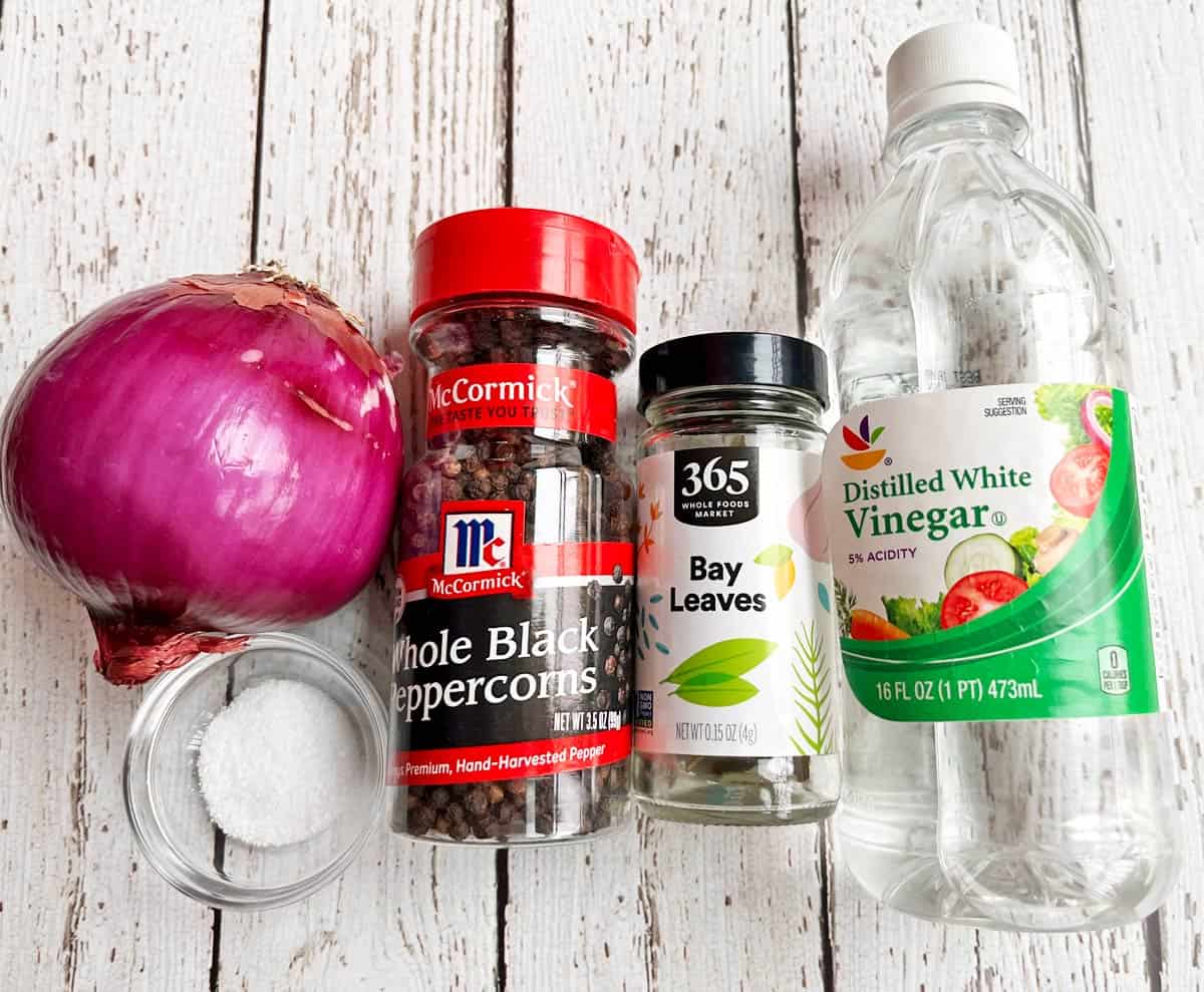 The ingredients needed to make pickled red onions.