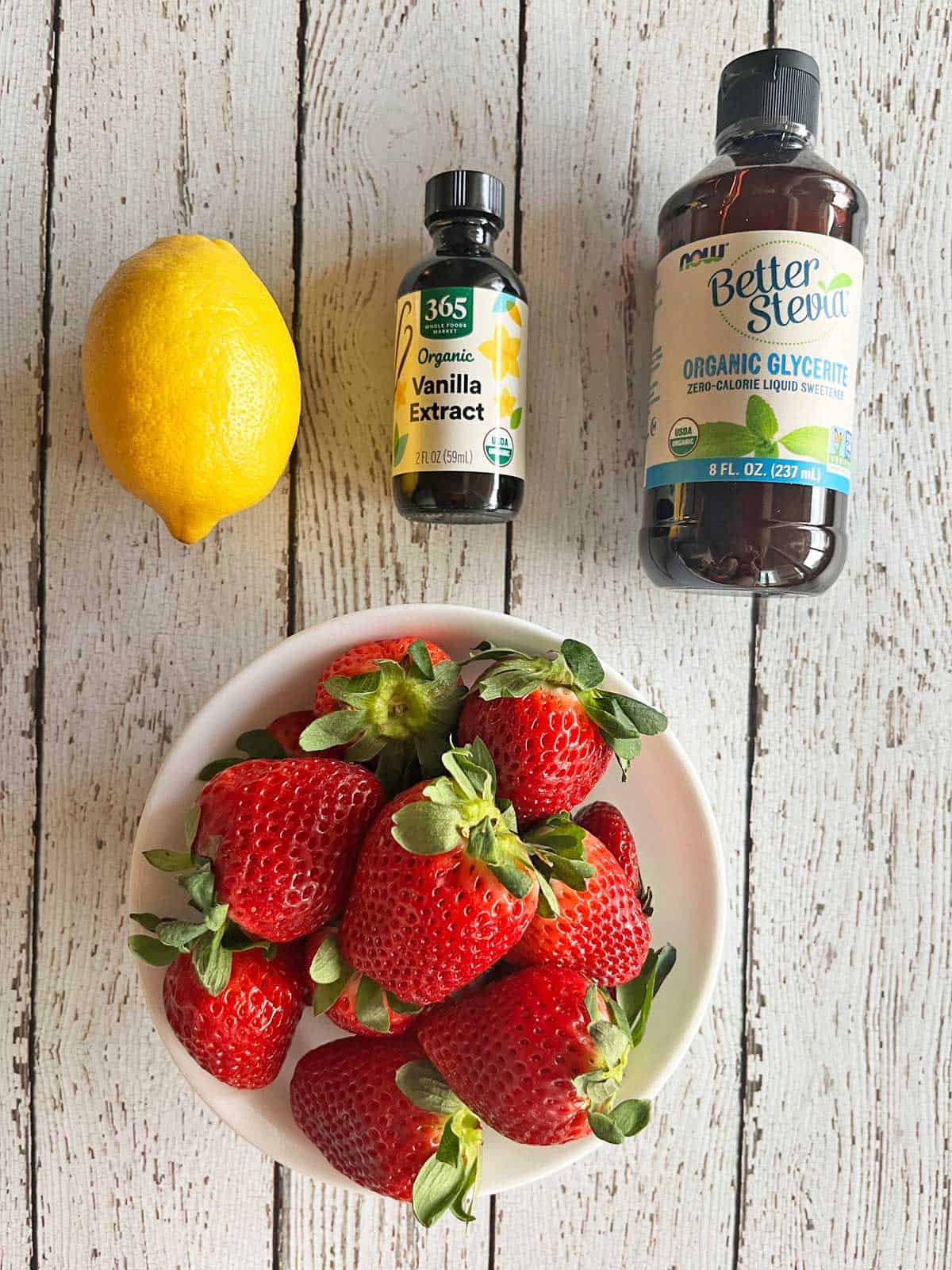 The ingredients needed to make a strawberry compote.