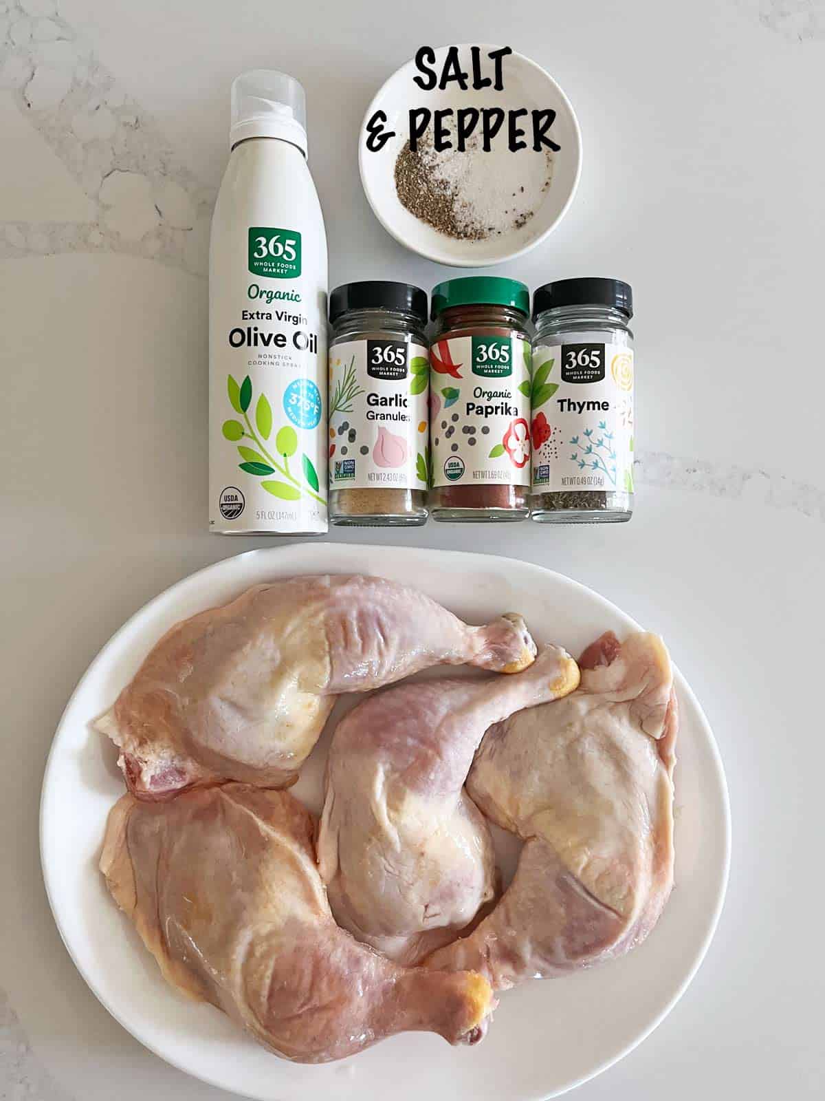 The ingredients needed to bake chicken leg quarters.