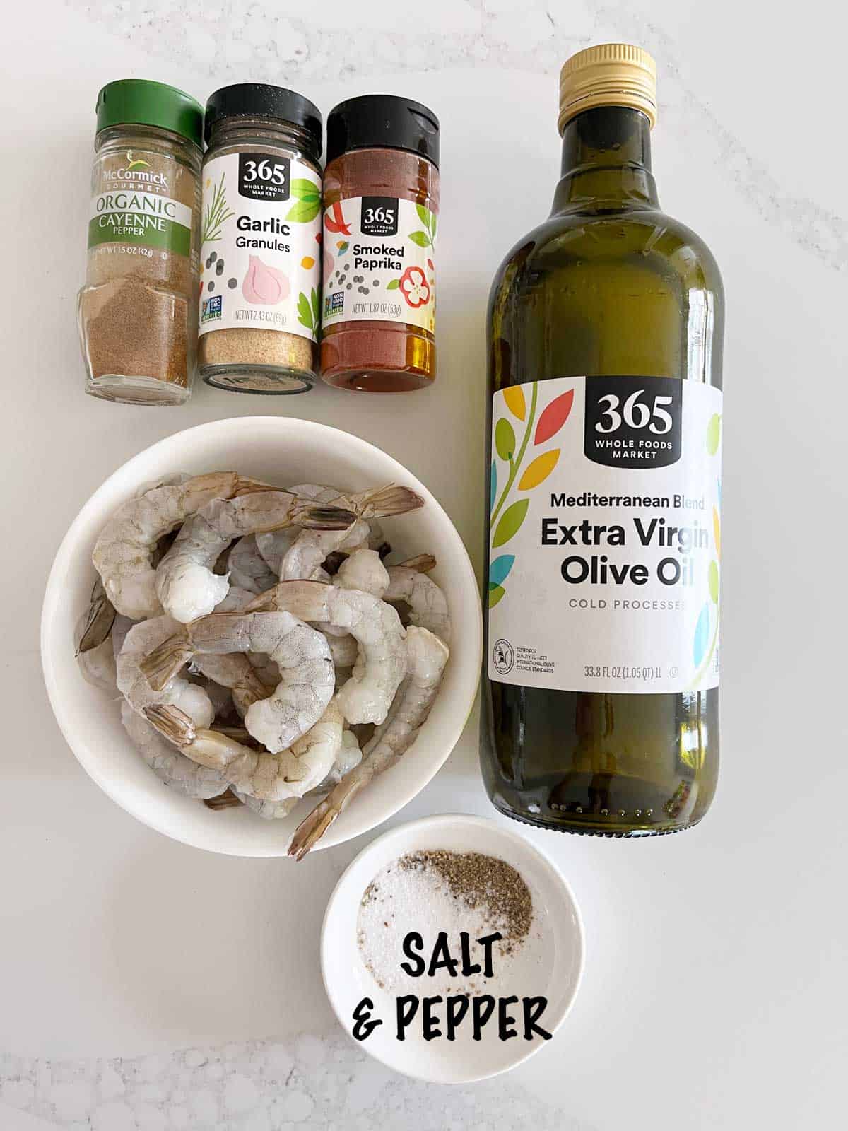 The ingredients needed for making grilled shrimp.