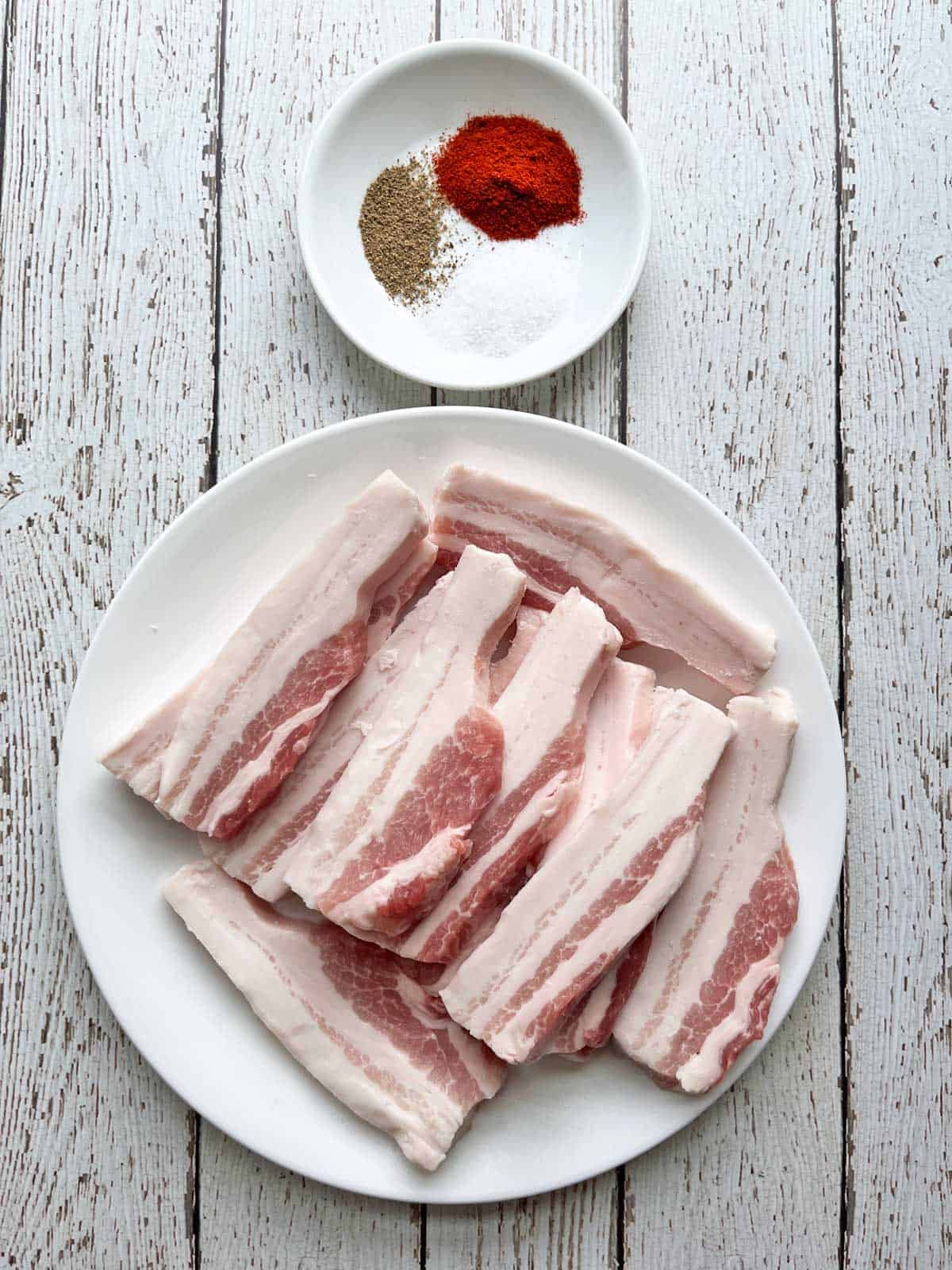 The ingredients needed to cook pork belly strips.