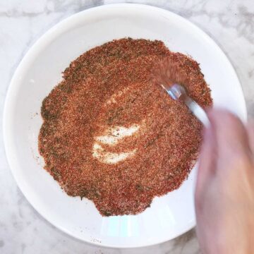 Mixing blackened chicken spices.