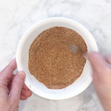 Mixing spices in a bowl.
