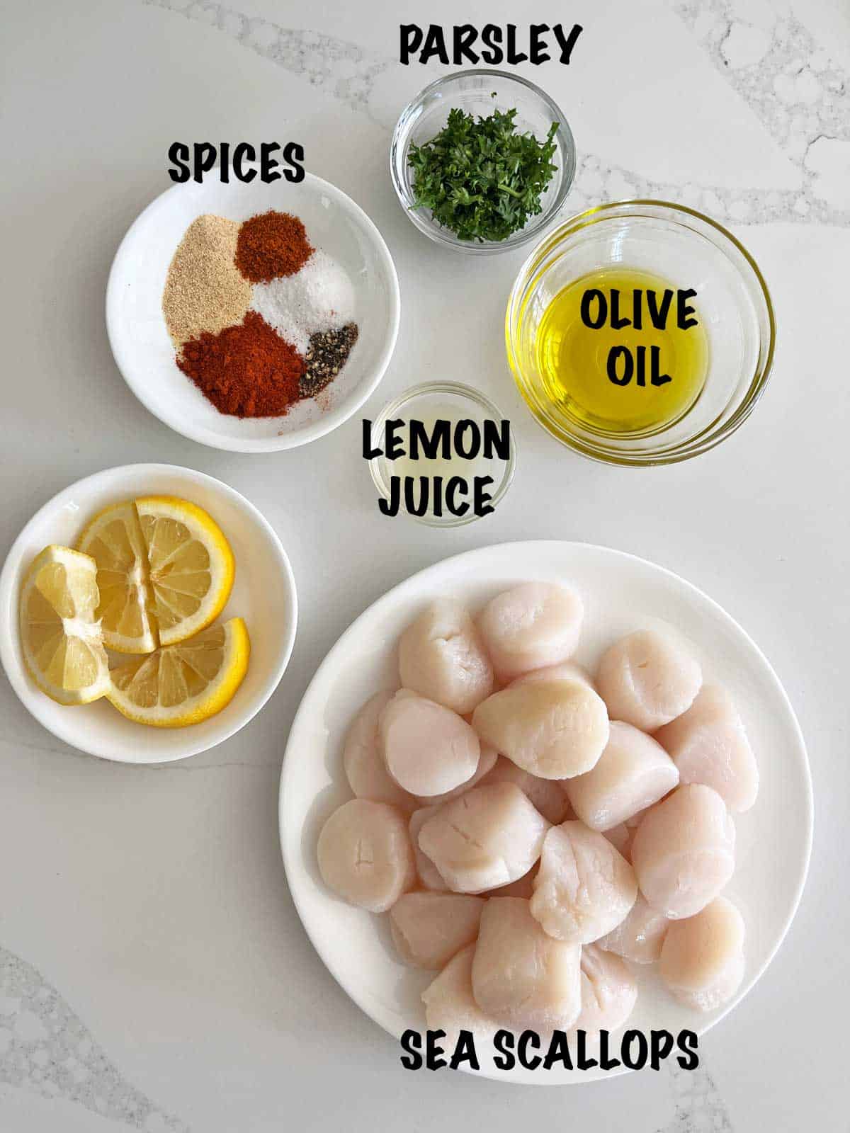 The ingredients needed to grill scallops.