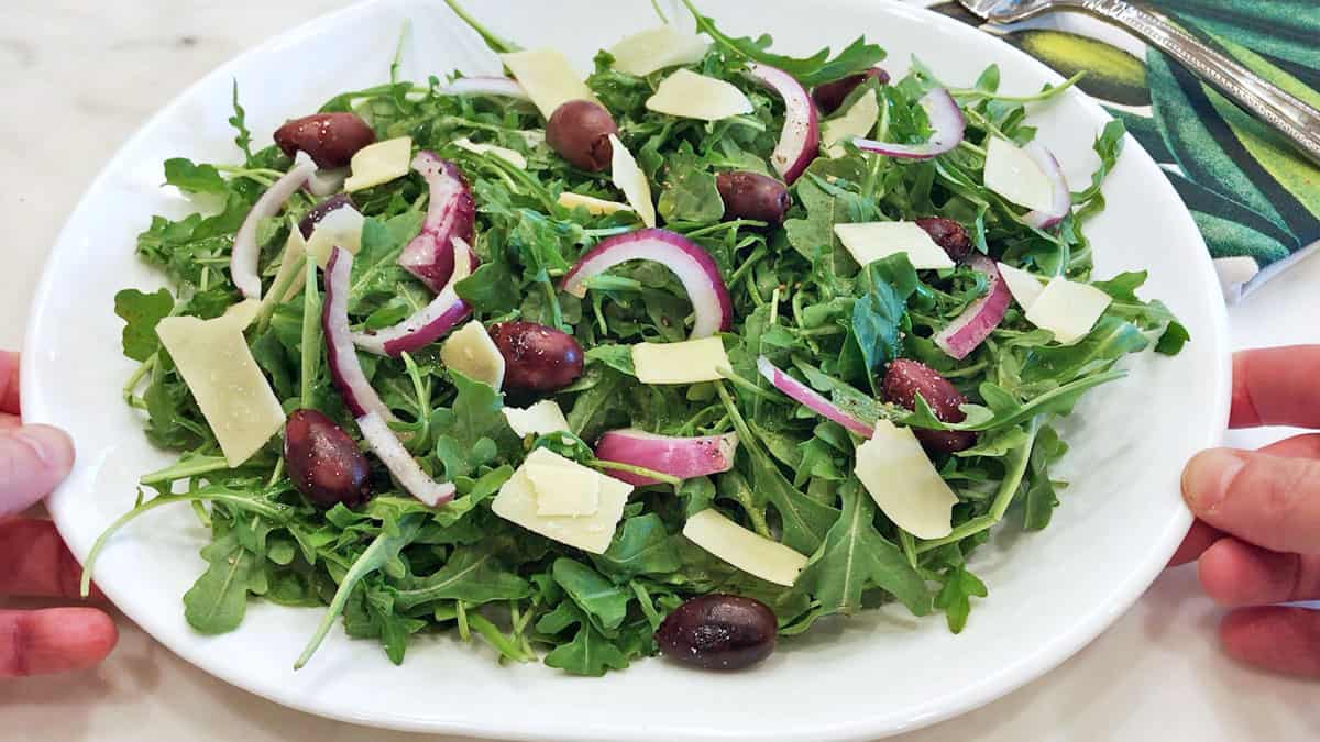 The salad is brought to the table.