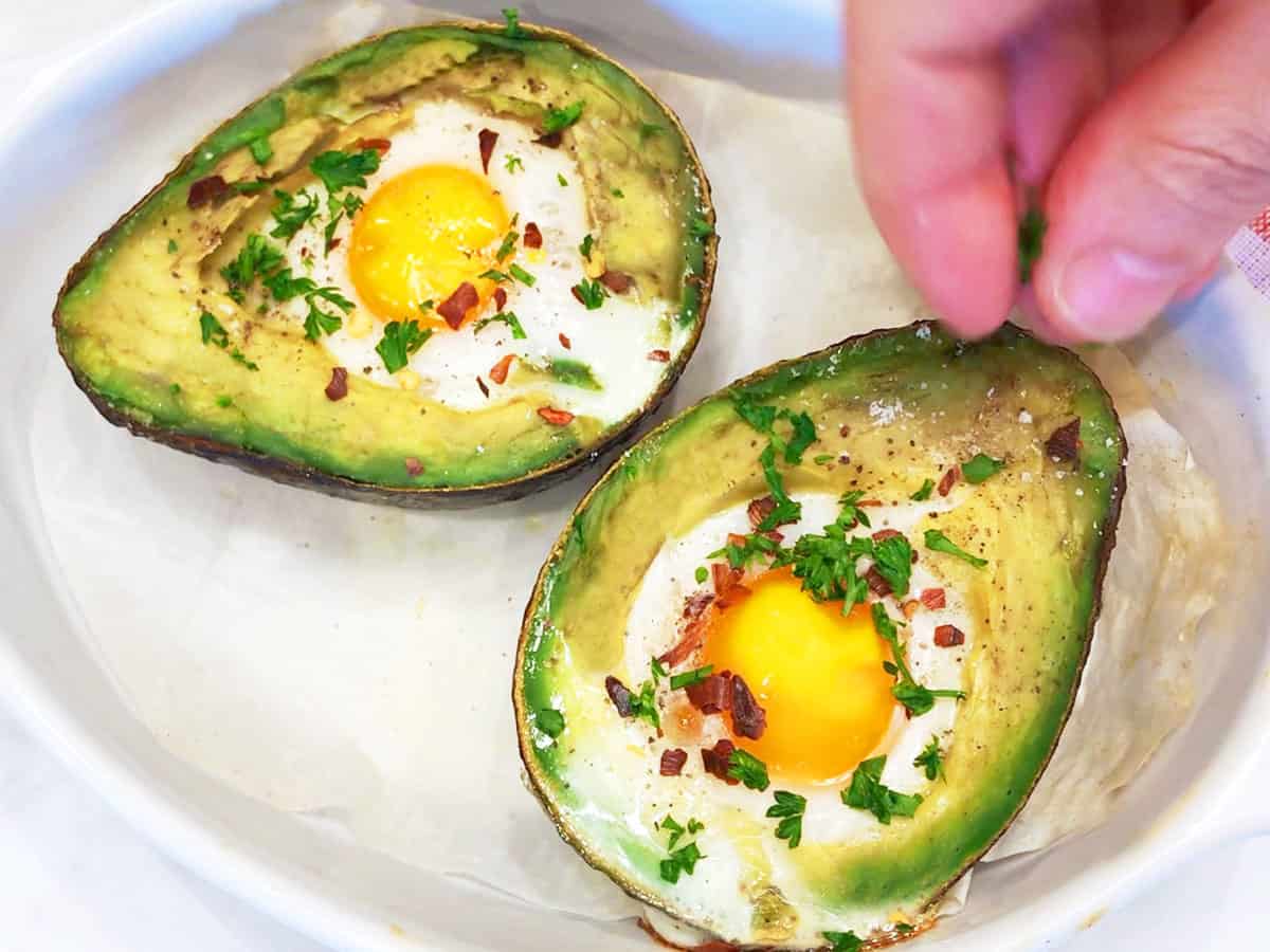 Baked avocado egg with crust on the yolk.