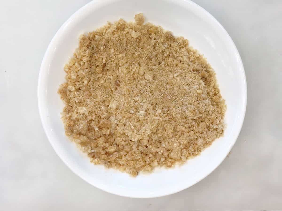 Crushed pork rinds in a bowl.