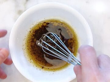 Mixing the marinade in a bowl.