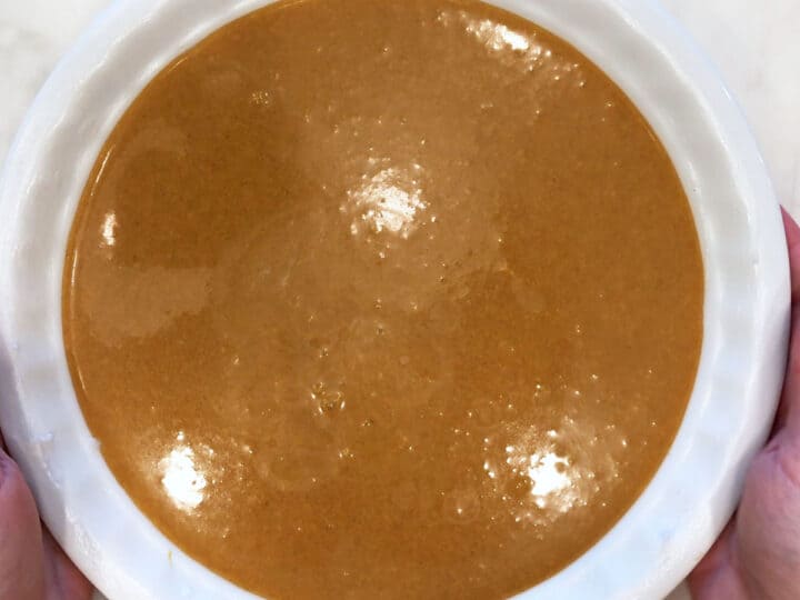 Pumpkin pie mixture in the pan.