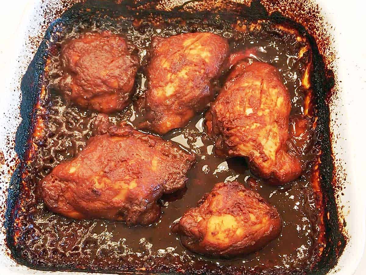 Chicken for pulled chicken recipe in the pan.