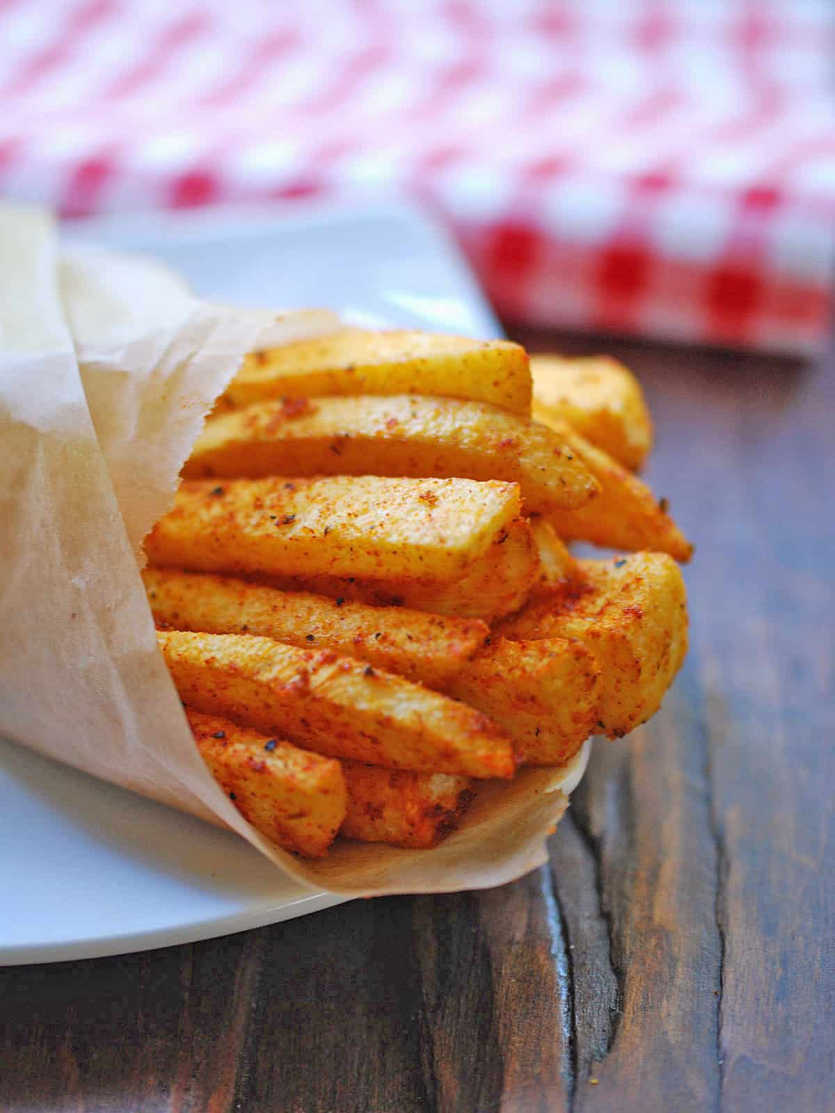 Jicama fries are served with a napkin.