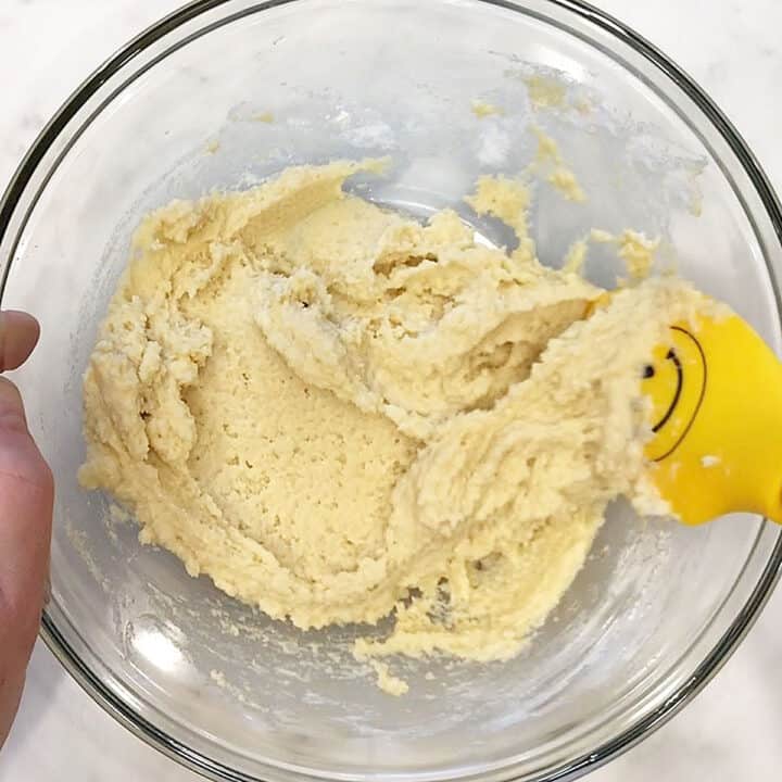 Mixing in the dry ingredients.