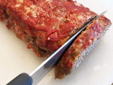 Slicing the meatloaf.