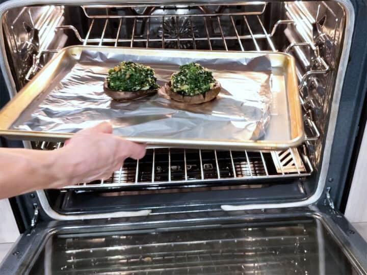 Returning the mushrooms to the oven.
