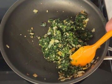 Cooking the filling in a skillet.