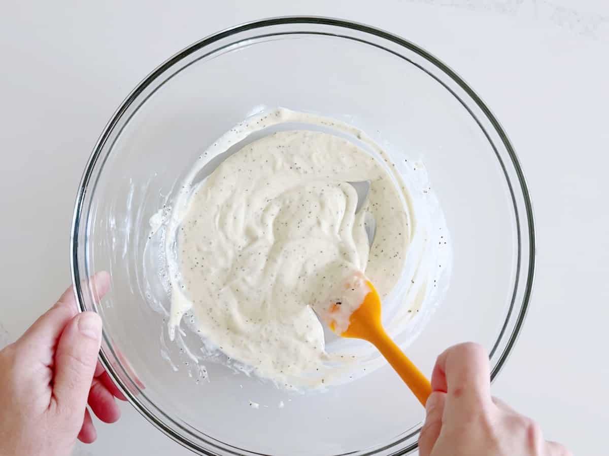 The coleslaw dressing is combined.
