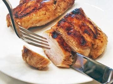 Slicing the chicken.