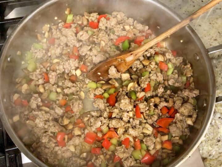 The sausage is cooked in the skillet.