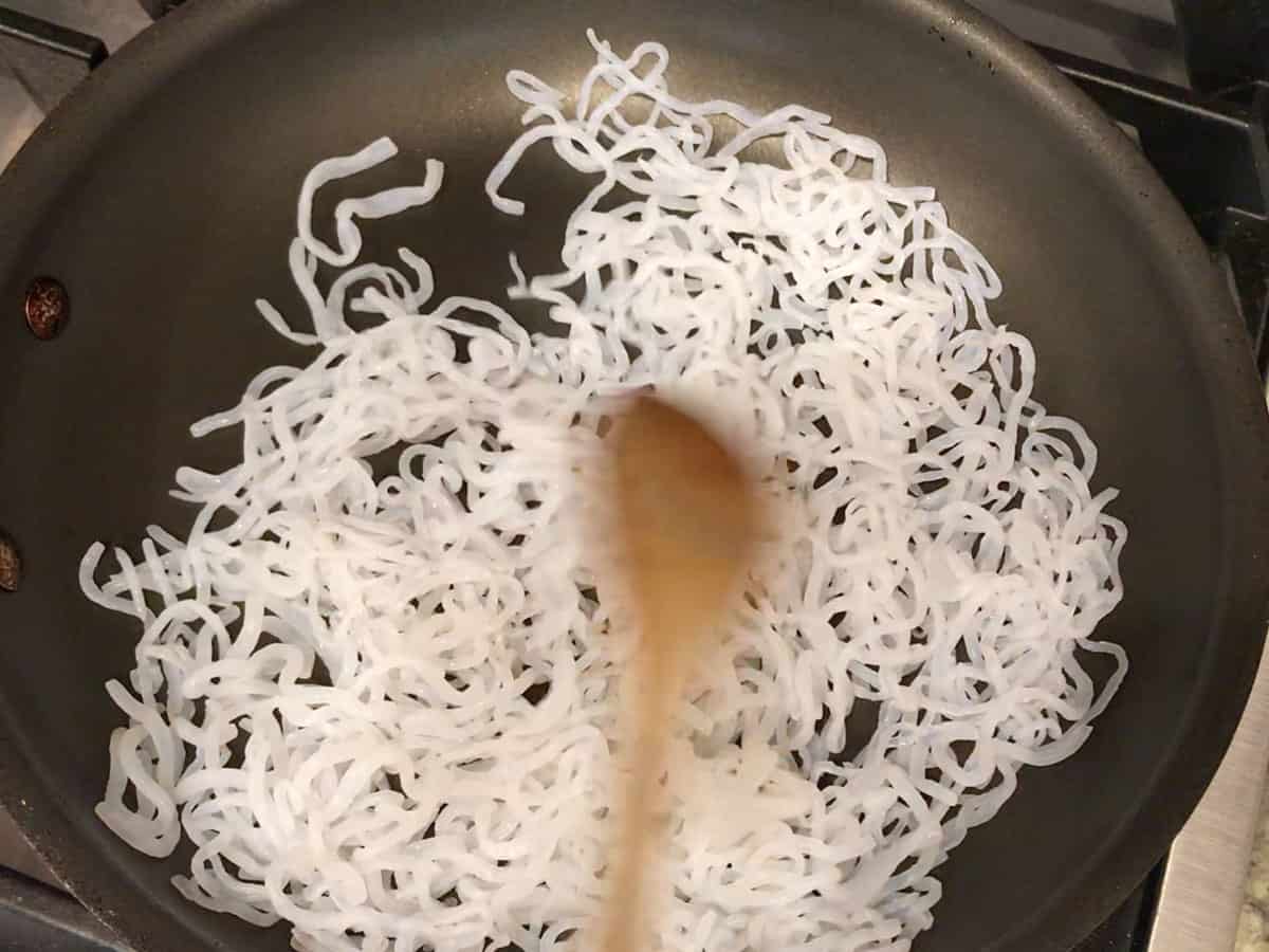 Dry-roasting the noodles in a dry skillet.