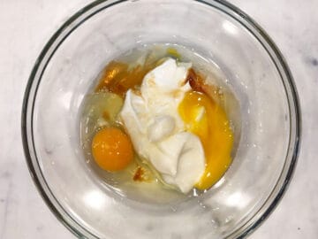 The liquid ingredients in a mixing bowl.