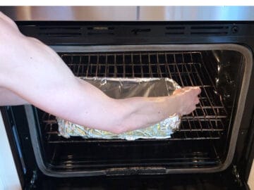 Placing the short ribs in the oven.