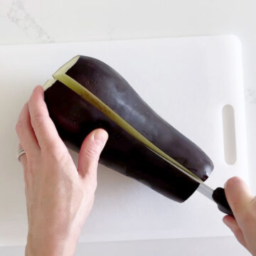Cutting the eggplant.