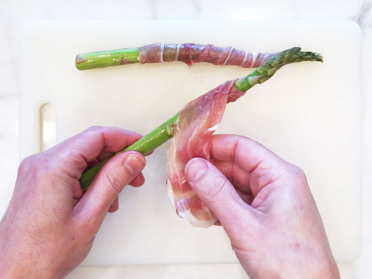 Wrapping the prosciutto in prosciutto, step one.