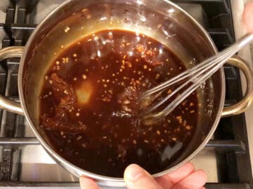 Mixing the glaze in the saucepan.