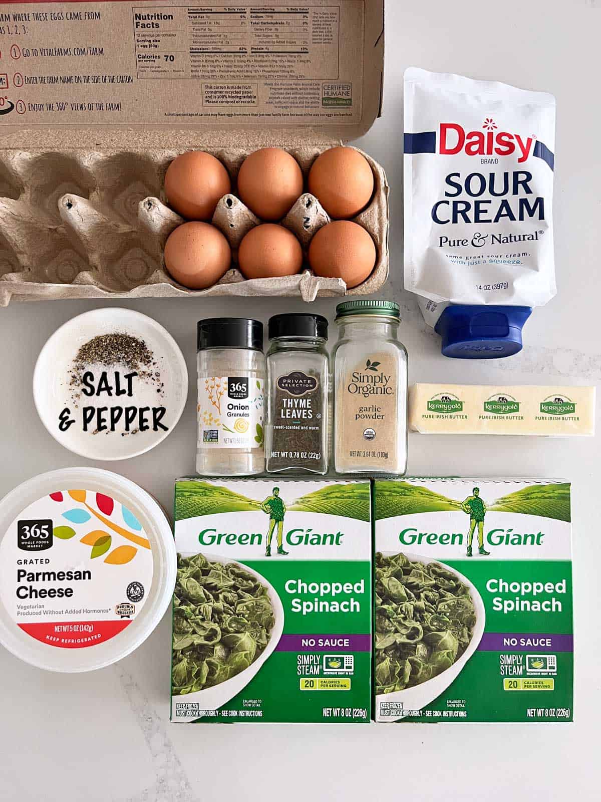 The ingredients needed to make a crustless spinach quiche.