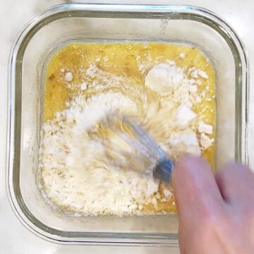 Mixing in the dry ingredients.
