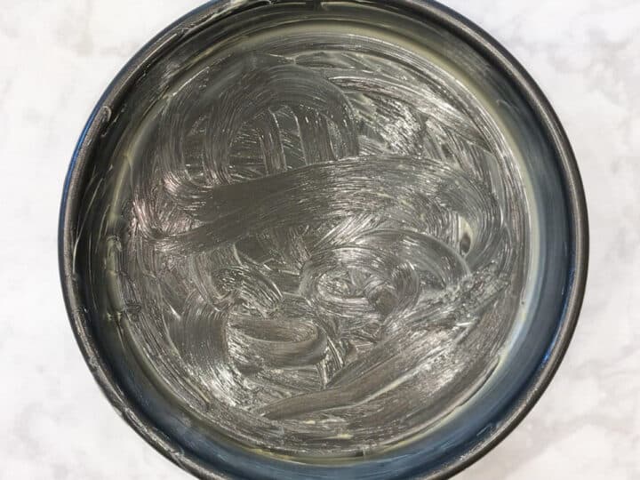 A greased nonstick cake pan.
