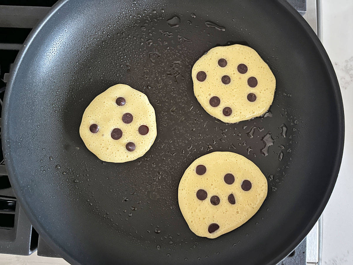 Chocolate chip protein muffins in a skillet.