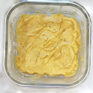 Spreading the batter in the container.