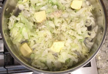 Adding butter, garlic, salt, and pepper.