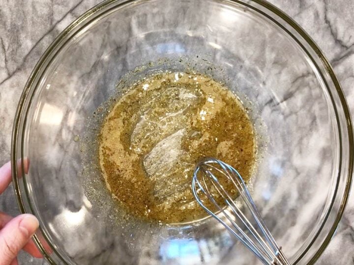 Mixing the marinade ingredients in a bowl.