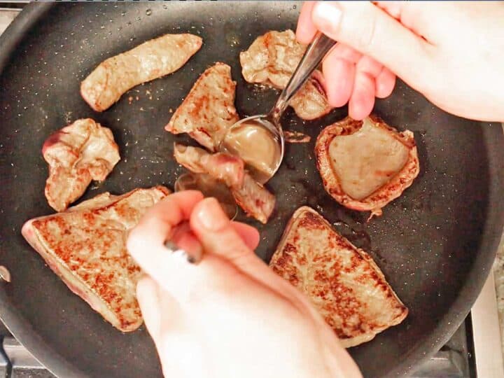 Cooking the liver edges.