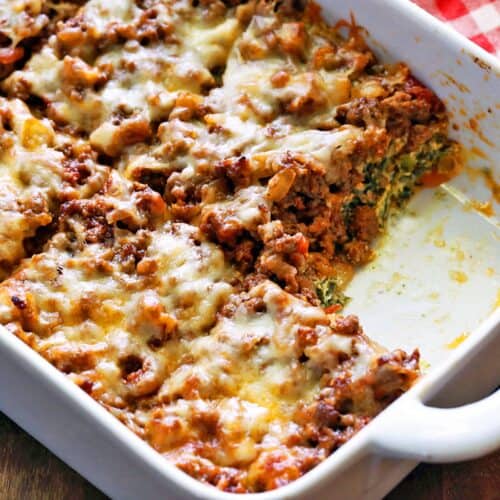 Keto lasagna is served in a white baking dish.