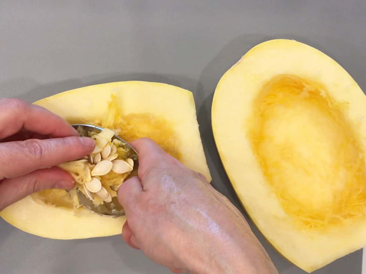 Removing the seeds and pulp.