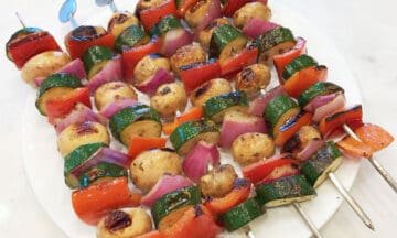 Veggie kabobs are served.