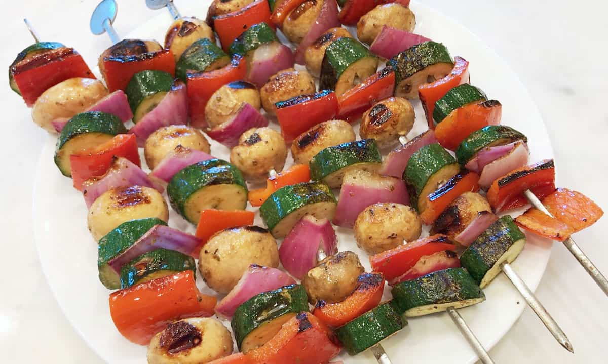Veggie kabobs are served.